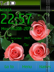 Roses on a dark background es el tema de pantalla