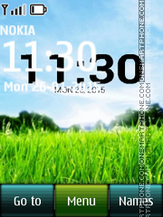 Nature Green Grass Digital Clock es el tema de pantalla